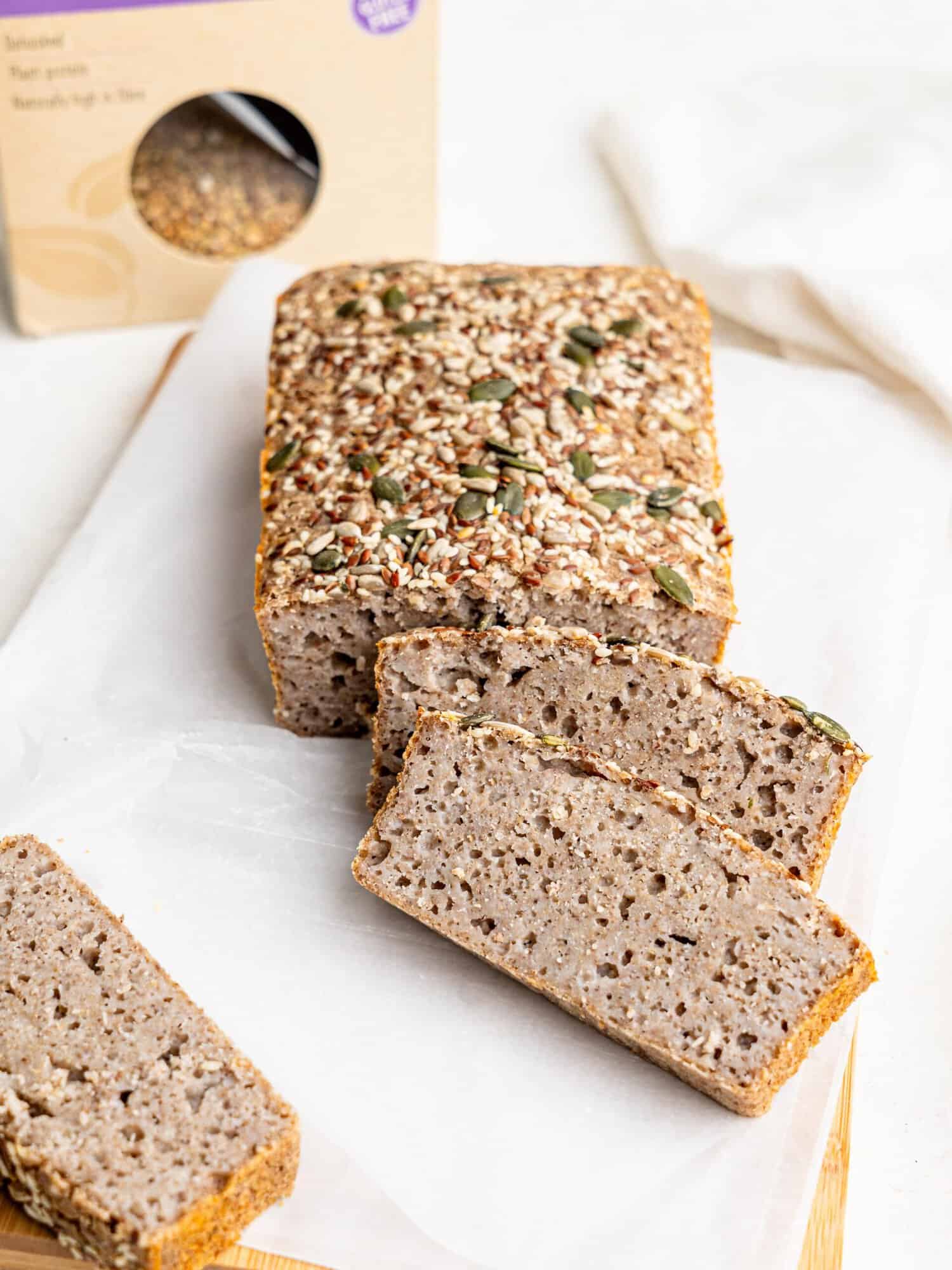 Buckwheat bread loaf on parchment paper.