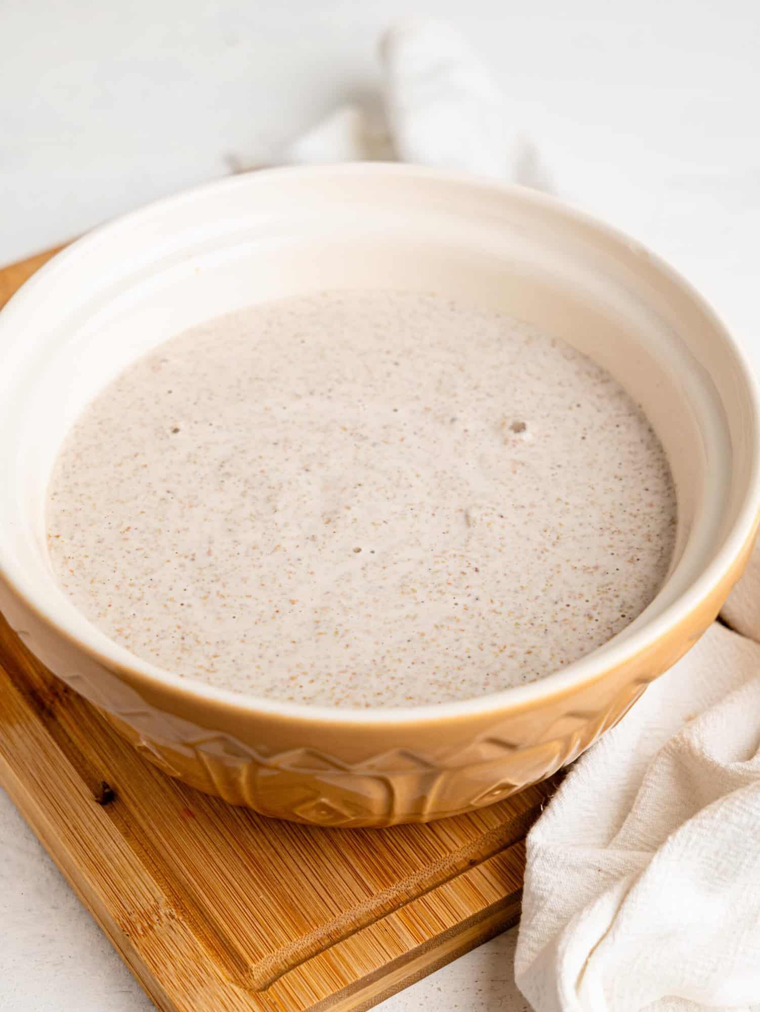Buckwheat bread mixture in a bowl before fermentation.