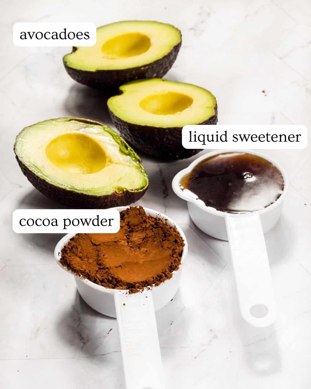 Ingredients for healthy chocolate avocado frosting.
