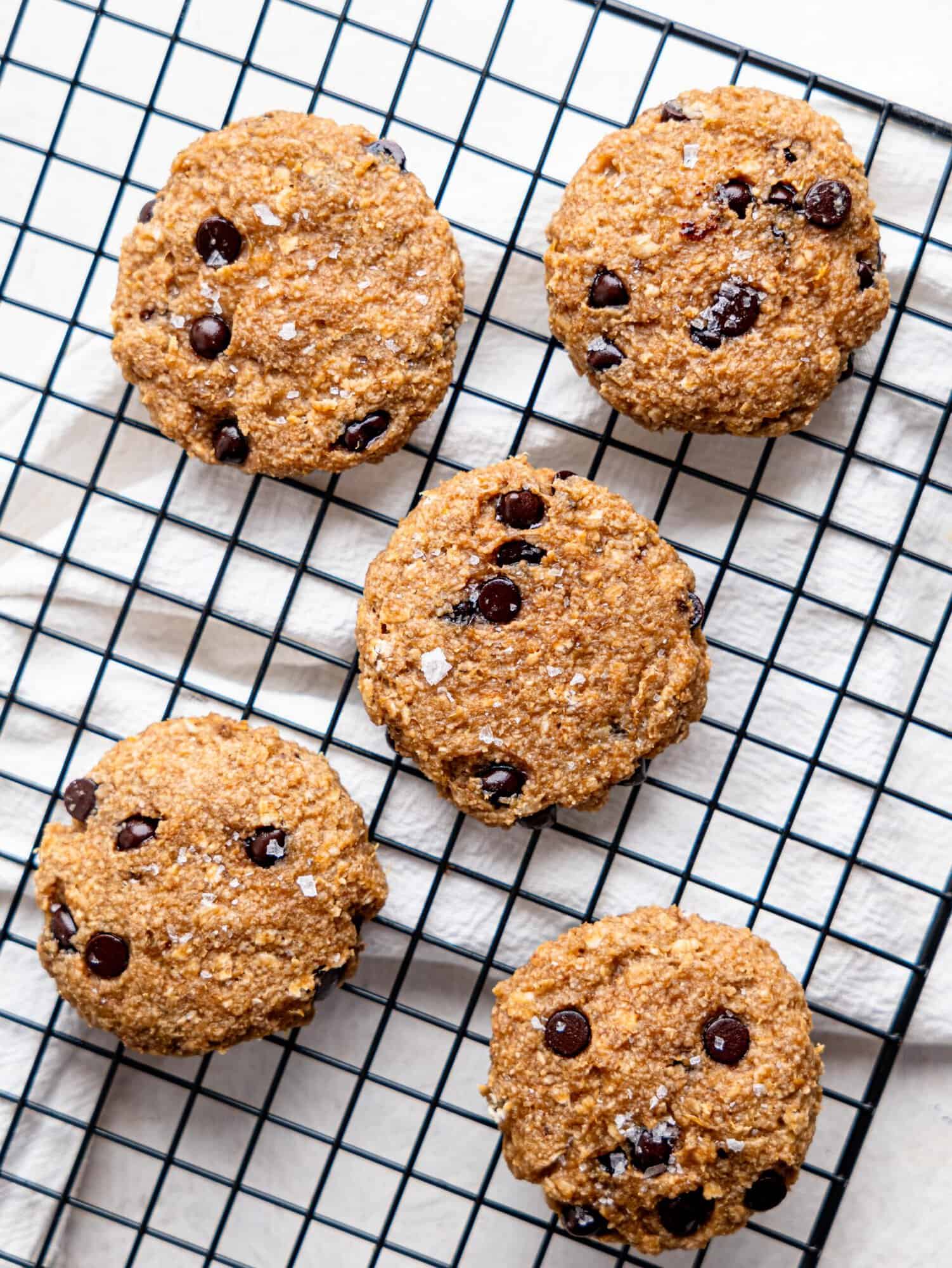 Bird's eye view of 4-ingredient banana oat cookies on a wire cooling rack.