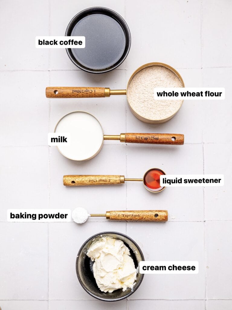 Tiramisu Pancakes Ingredients in measuring cups: black coffee, whole wheat flour, baking powder, liquid sweetener, milk and cream chese.