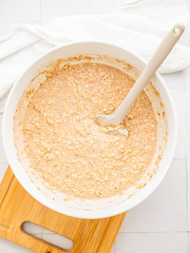 Cinnamon Roll Oatmeal mixture in a bowl before baking.