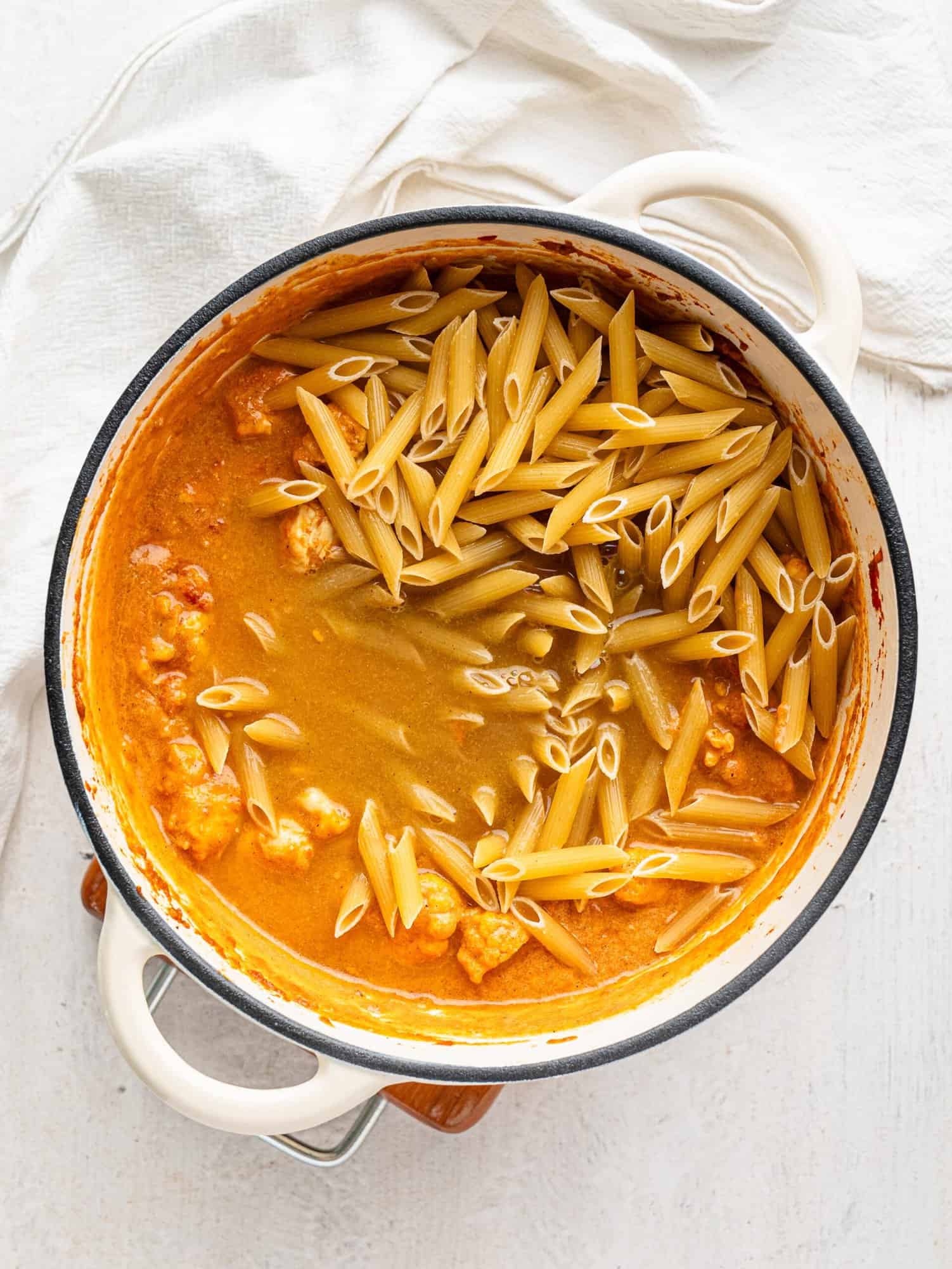 Butter chicken with pasta.