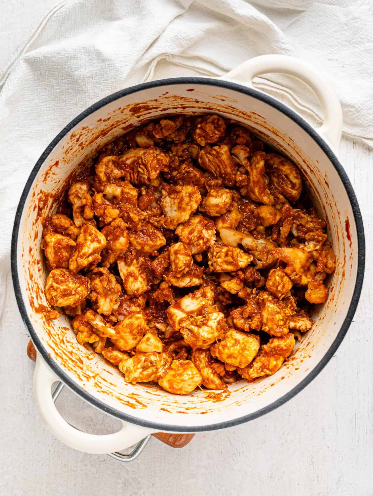 Cooked chicken, cauliflower and spices.
