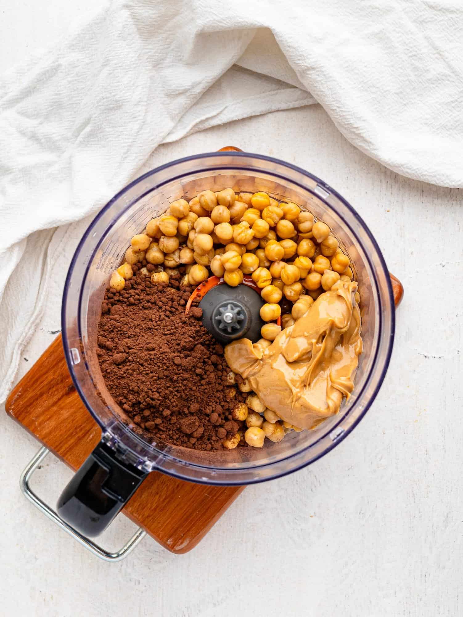 Chickpea chocolate truffles ingredients in a blender.