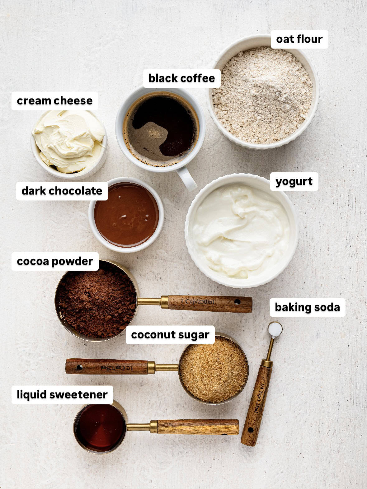 Tiramisu brownie ingredients on a white counter.