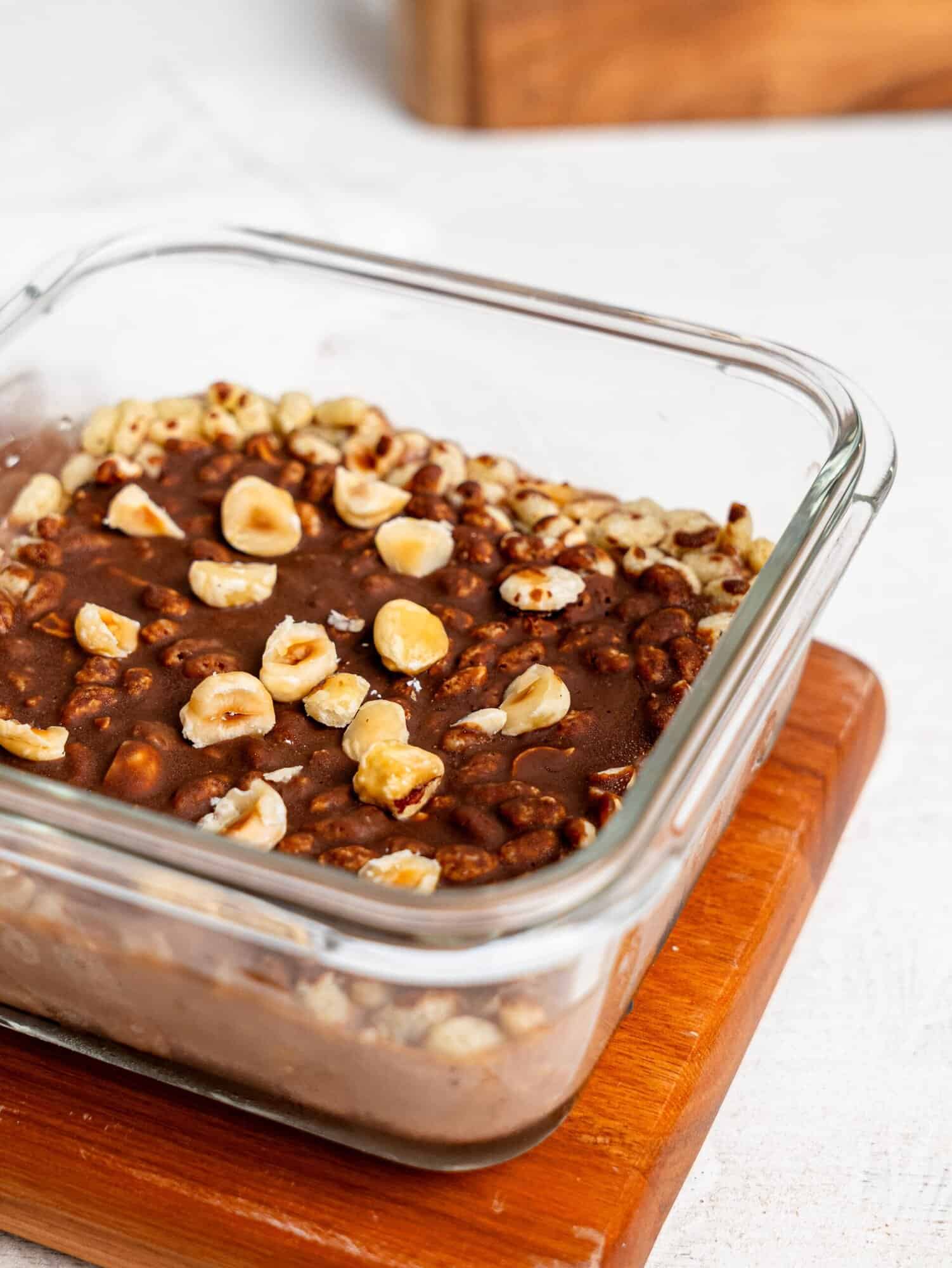 Ferrero Rocher Protein Overnight Oats in a glass meal-prep container.