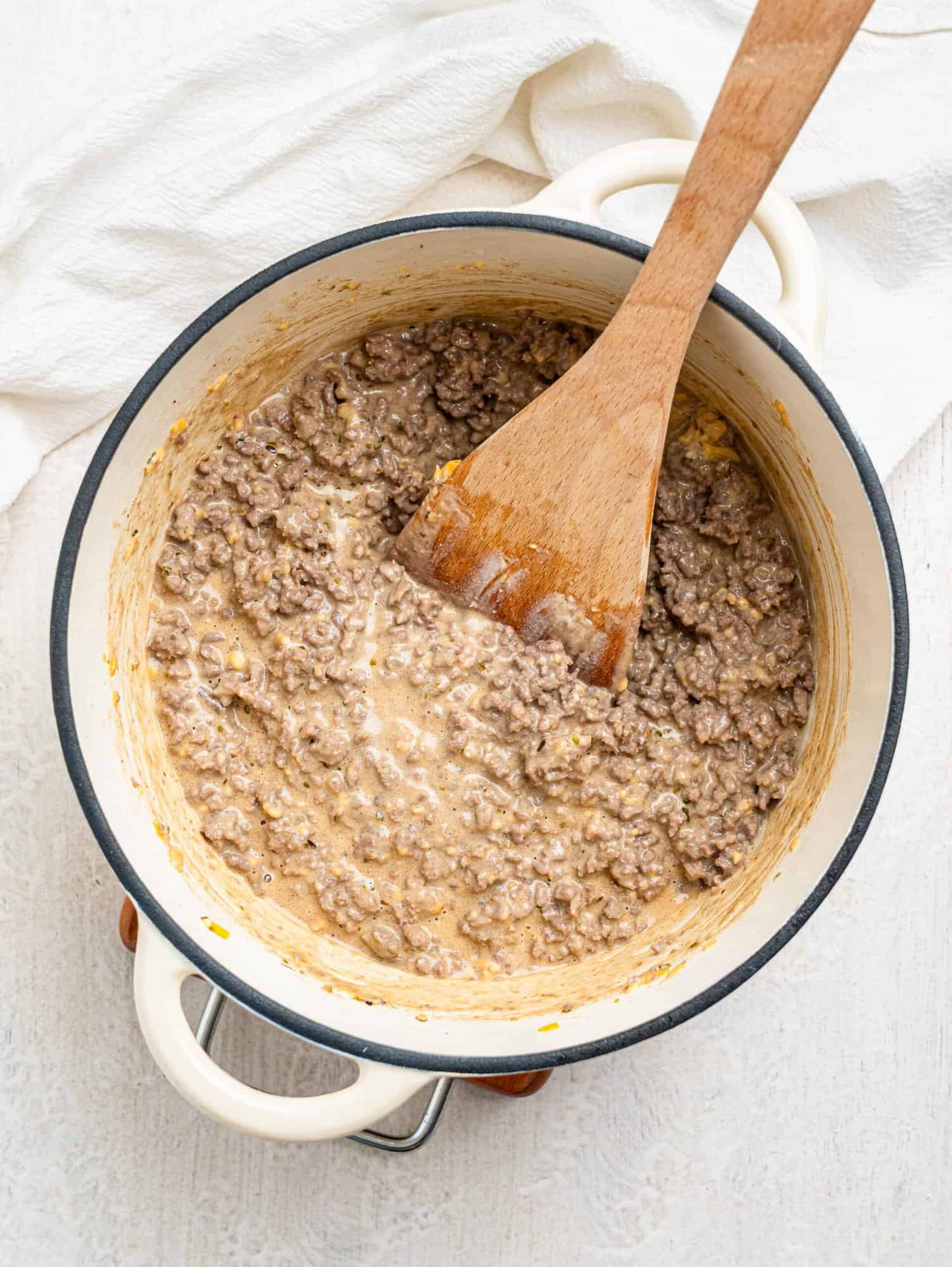 Creamy cheesy mince in a large pot.