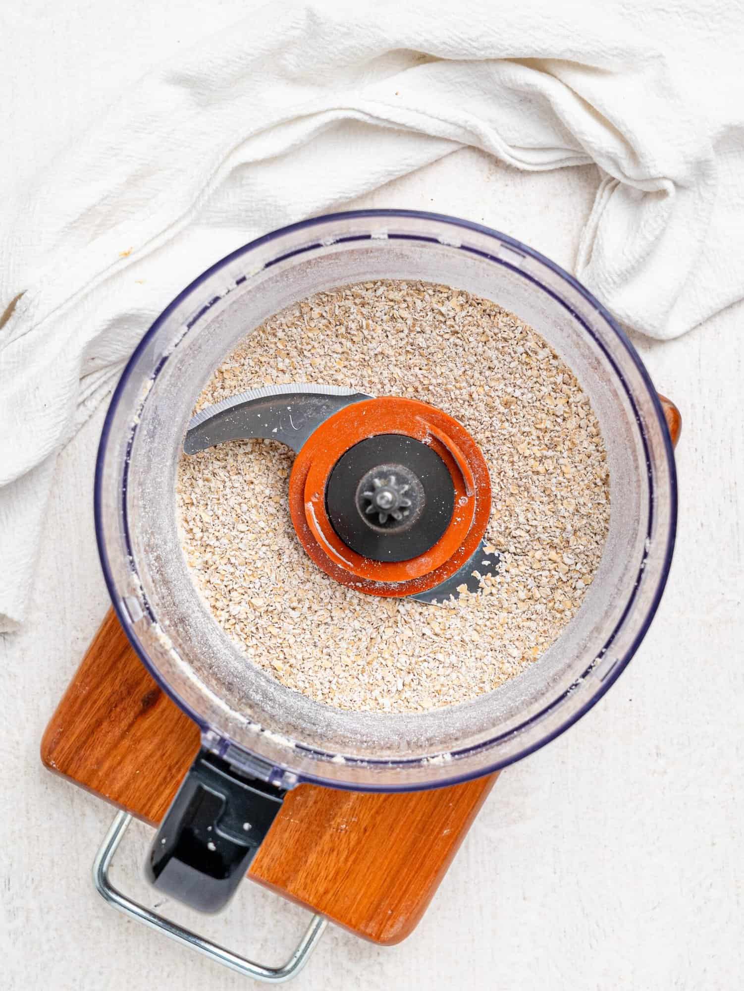 Blended oats in a food processor.