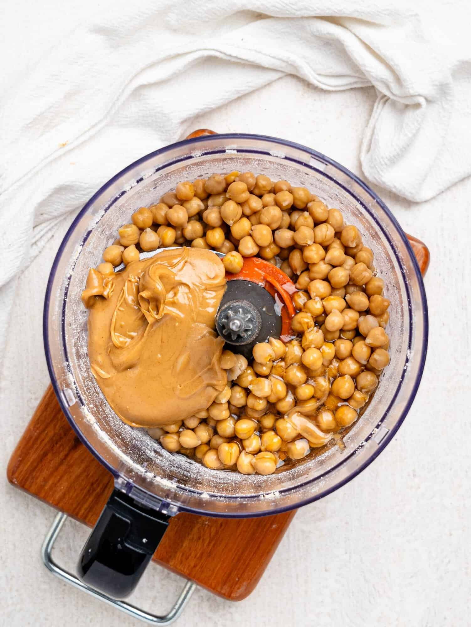 Chickpea cookie dough ingredients in a blender.