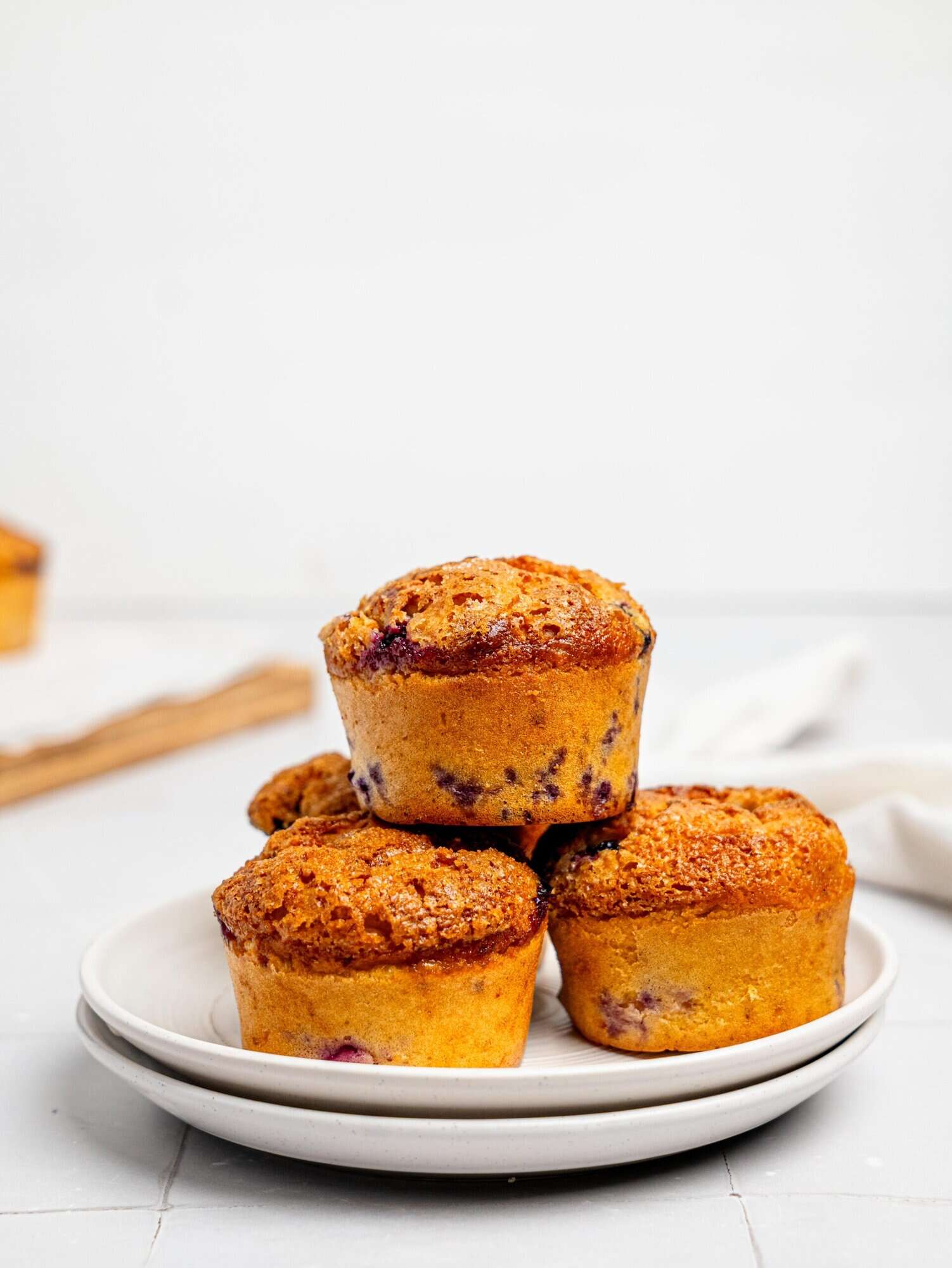 Blueberry Cottage Cheese Muffins on a white plate.