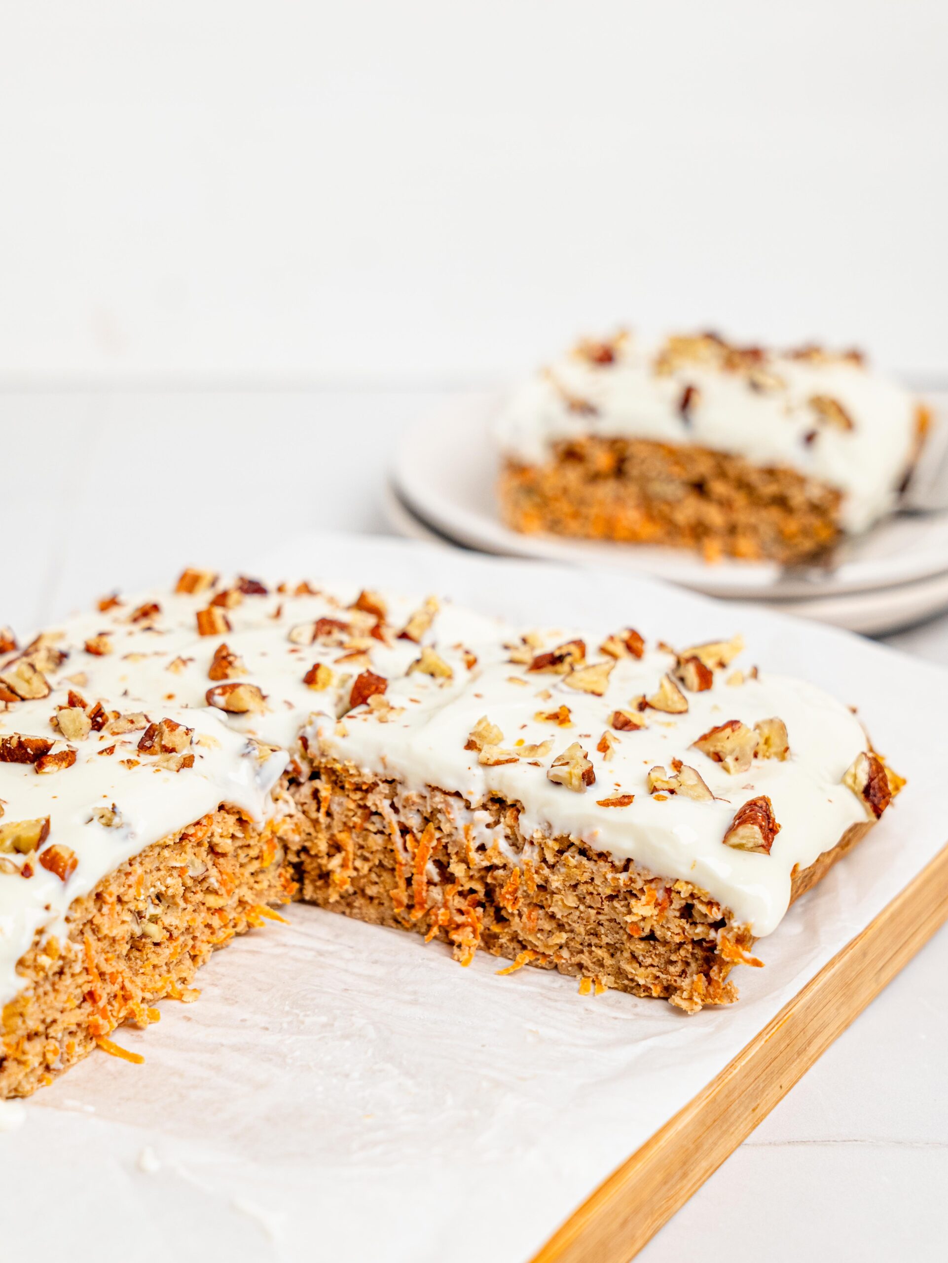 Carrot cake baked oats on a chopping board.