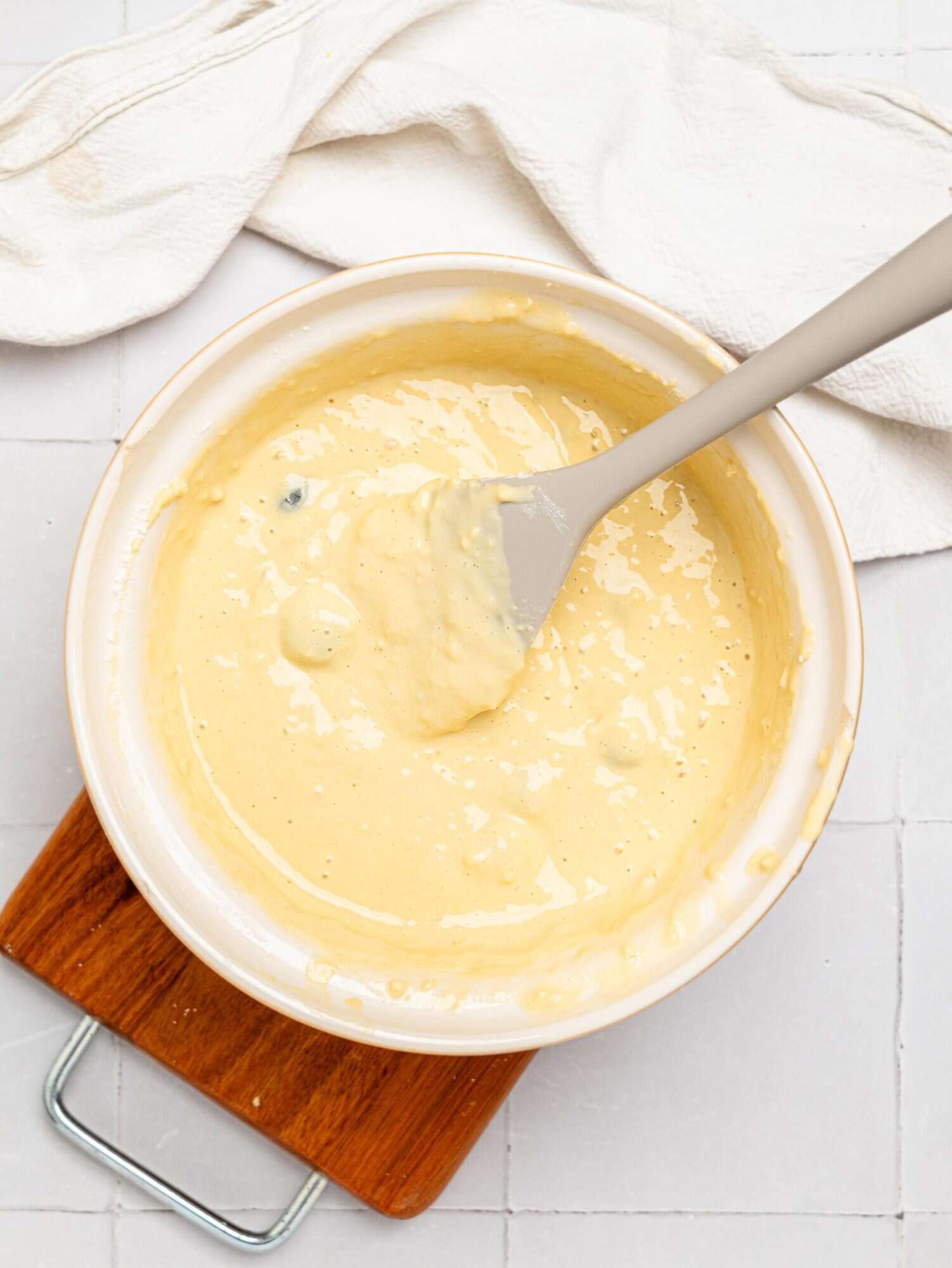 Blueberry Cottage Cheese Muffin batter in a white mixing bowl.