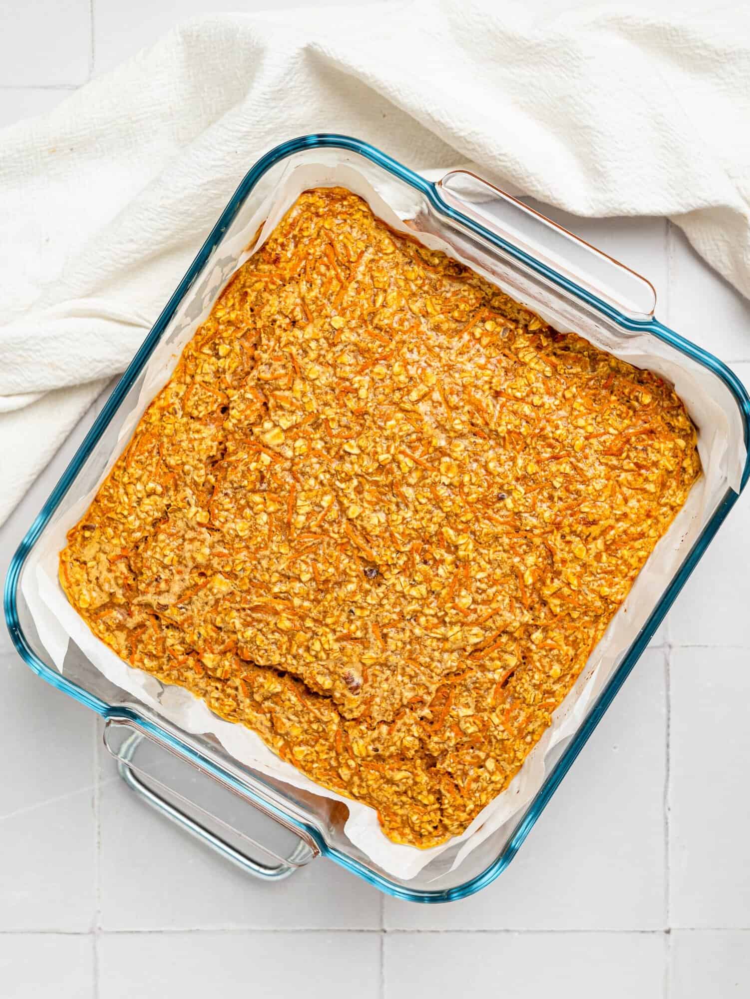 Carrot Cake baked oatmeal in a glass baking dish.