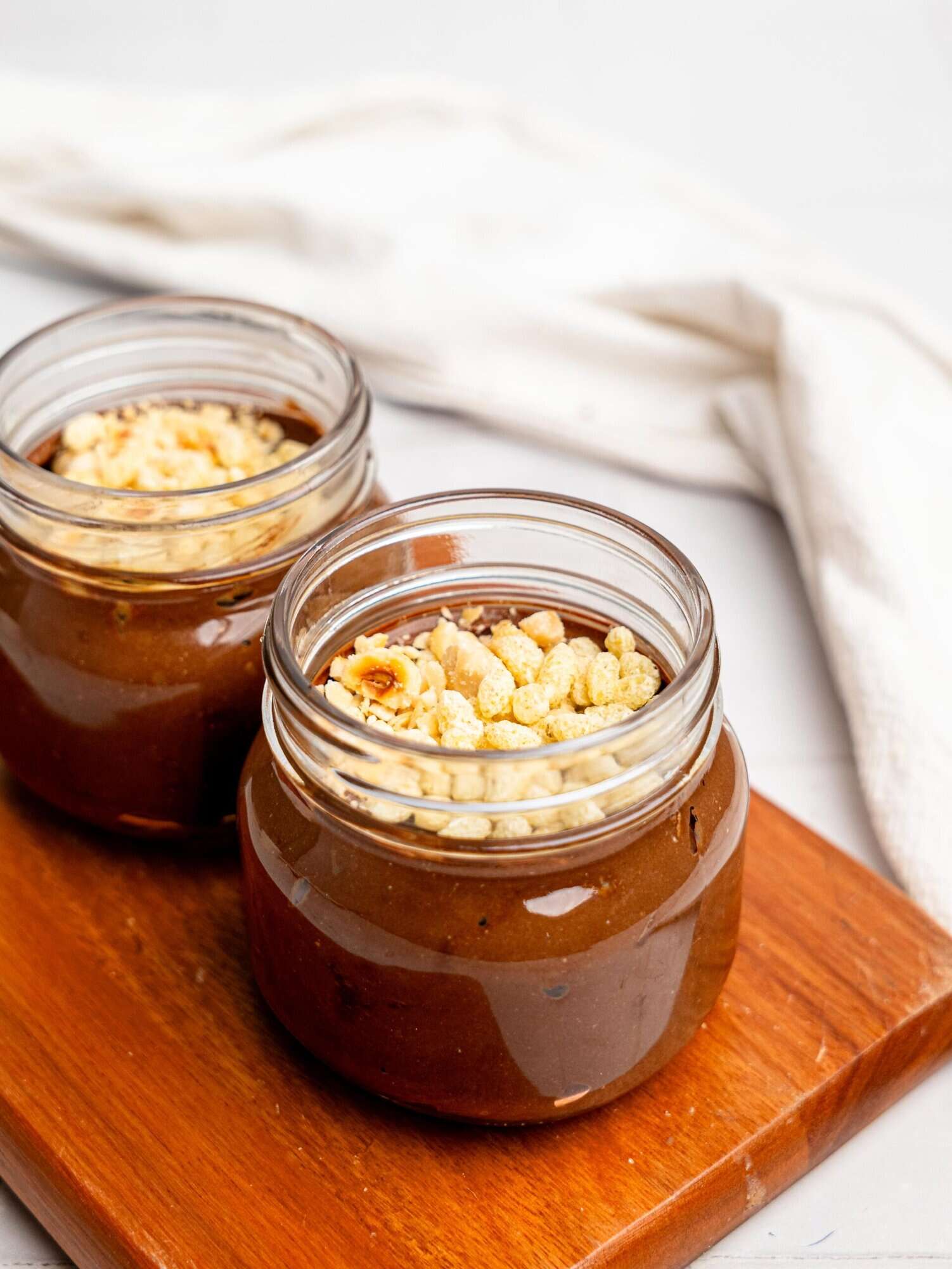 Two jars of Ferrero Rocher Cottage Cheese Chocolate Pudding.