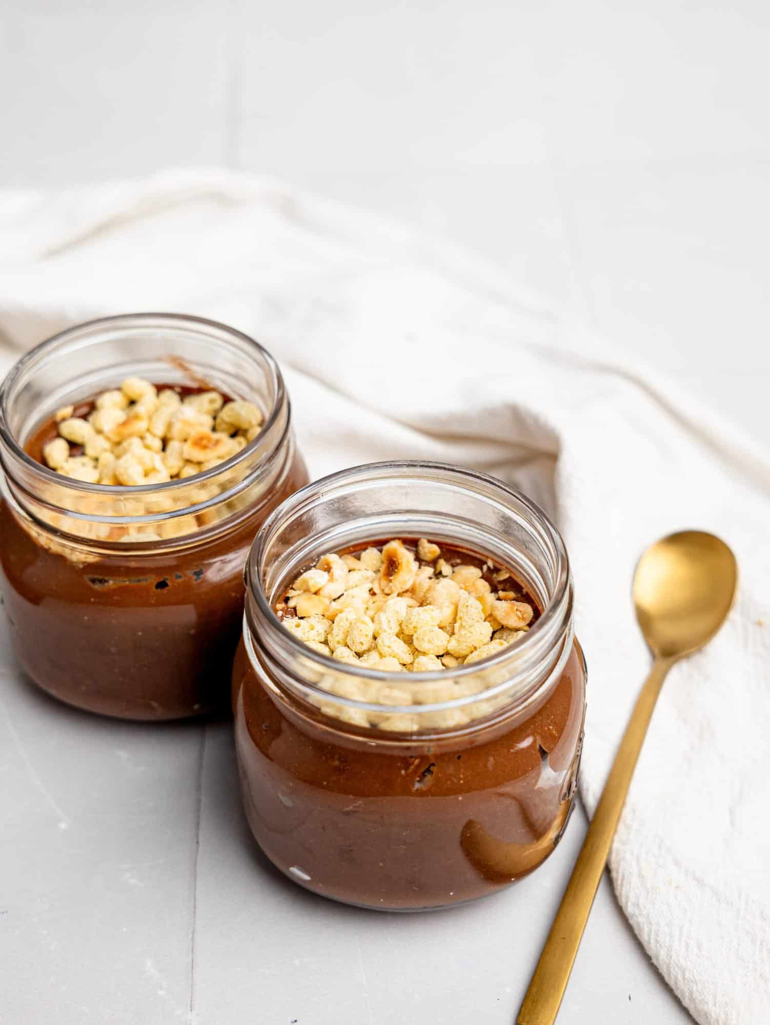 Two jars of Ferrero Rocher Cottage Cheese Chocolate Pudding.