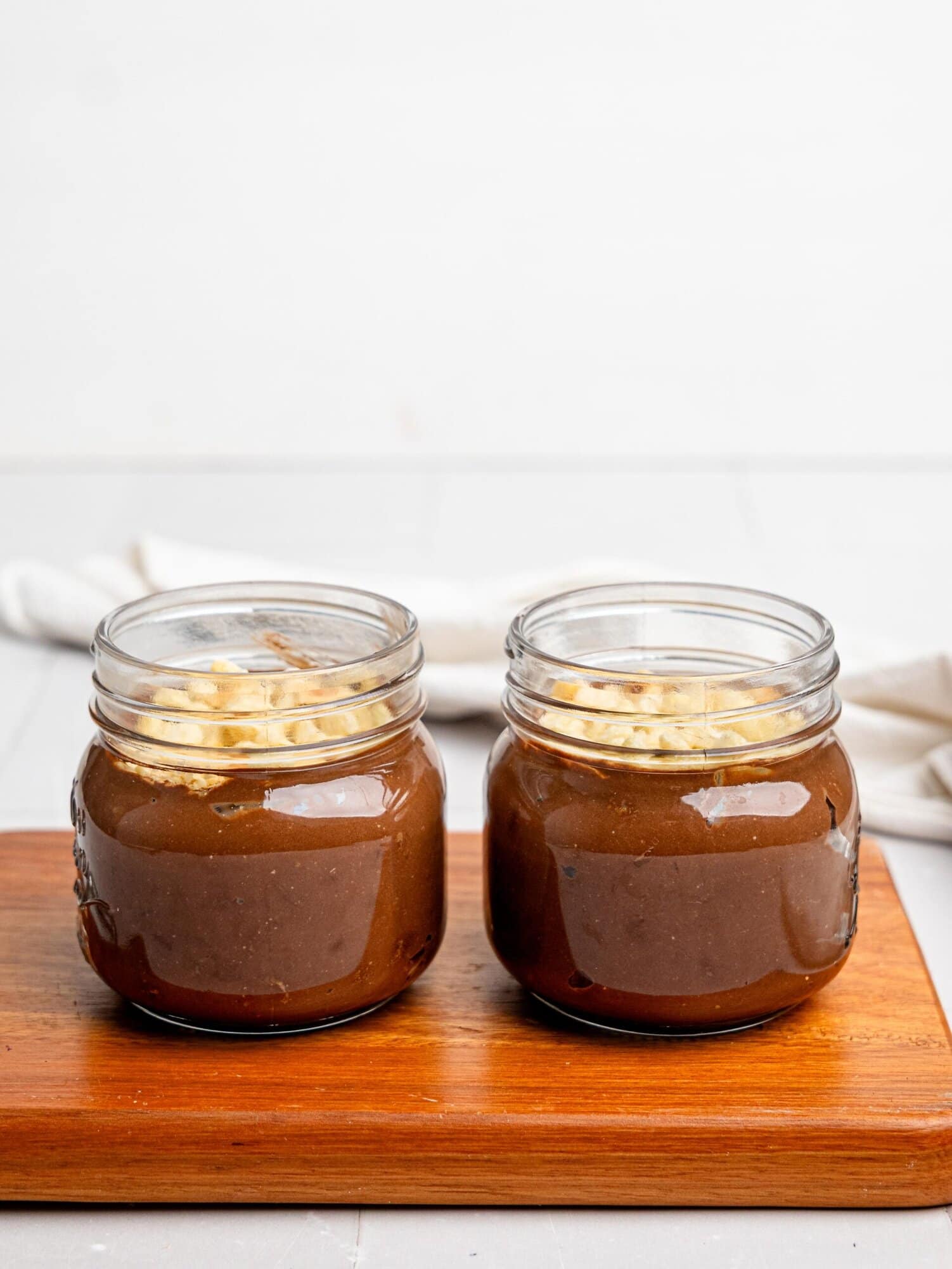 Two jars of Ferrero Rocher Cottage Cheese Chocolate Pudding.