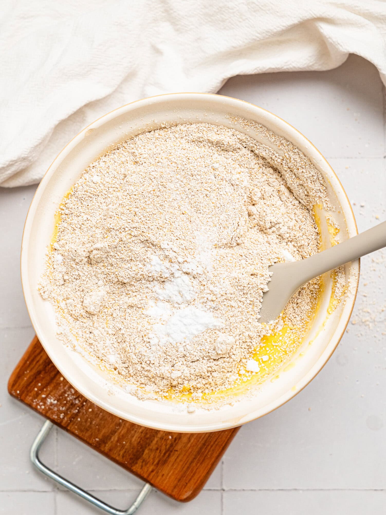 Oat flour bread ingredients in a mixing bowl.
