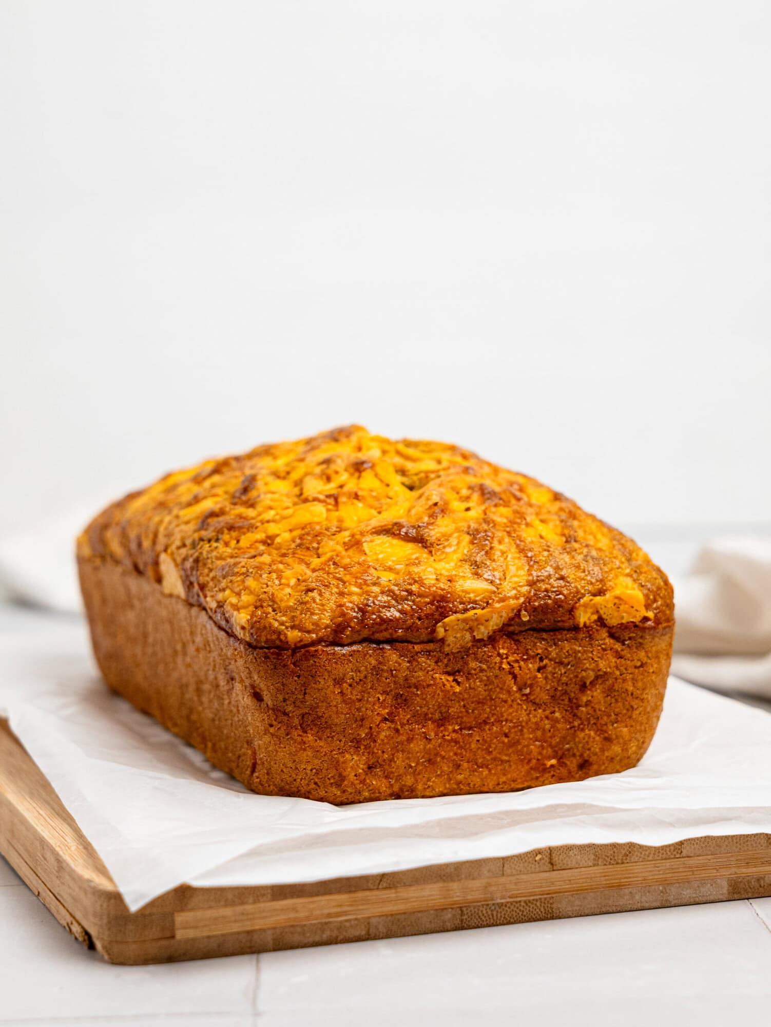 Oat flour bread on a cutting board.