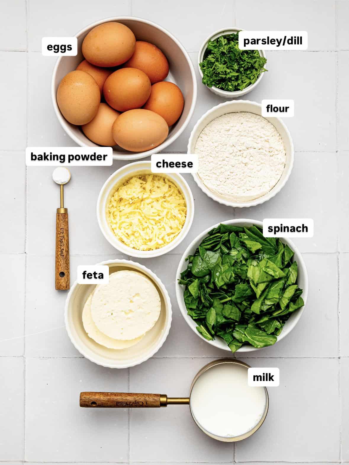 Ingredients to make feta and spinach egg bake.