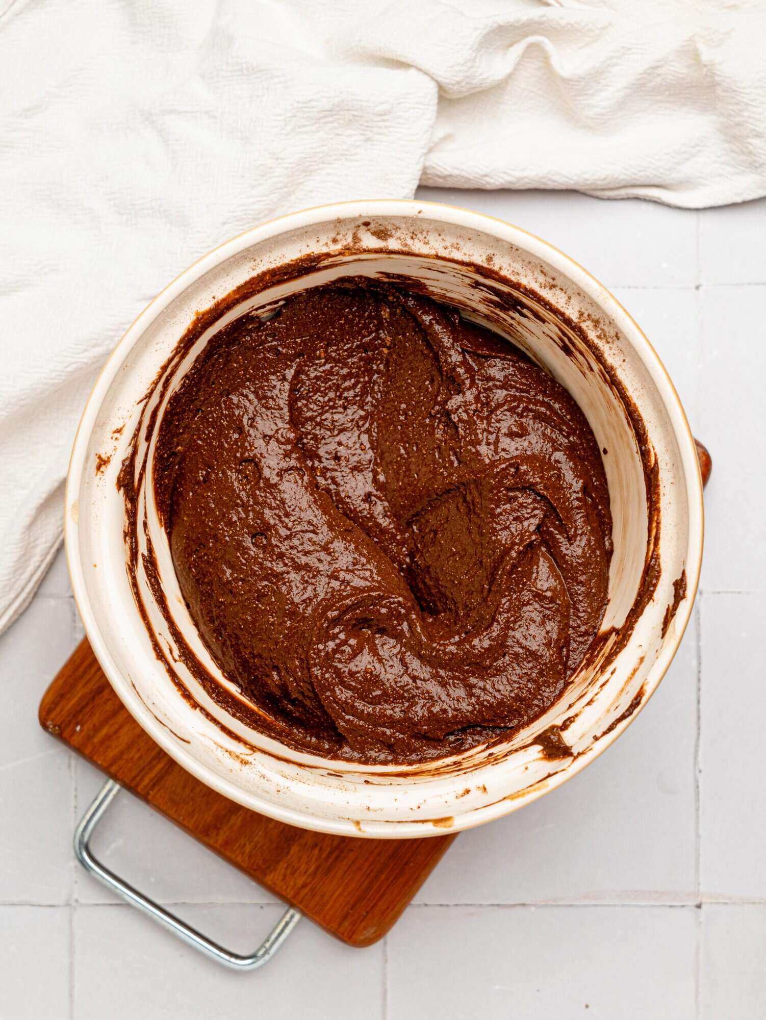 Healthy chocolate brownie batter in a mixing bowl.