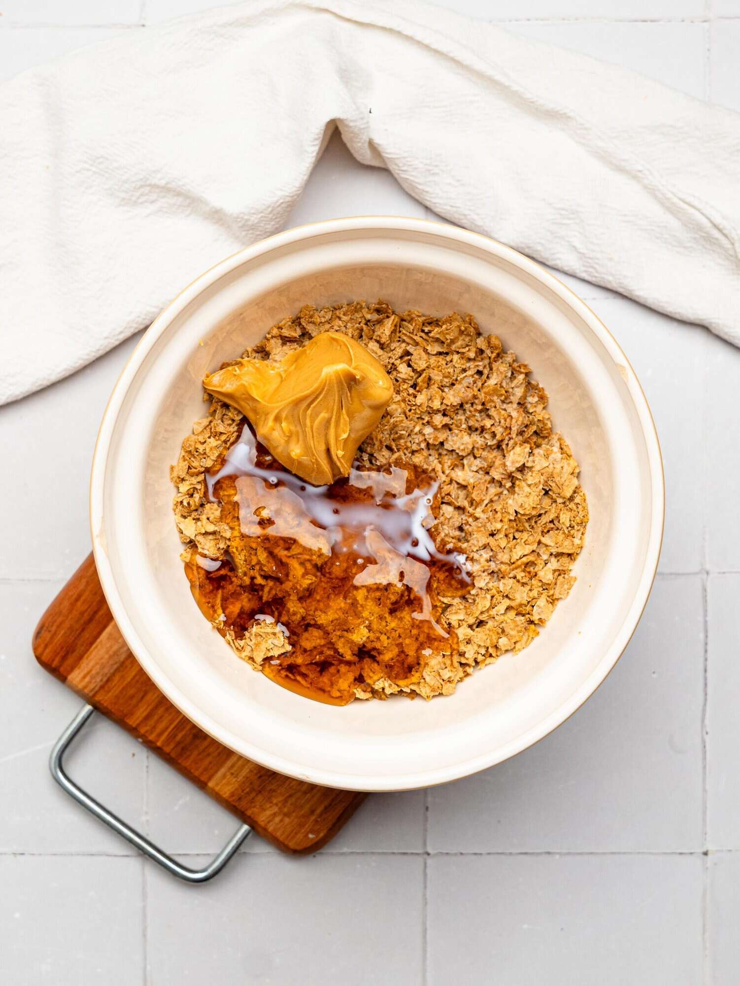 Peanut BUtter Weetabix cups base ingredients in a mixing bowl.