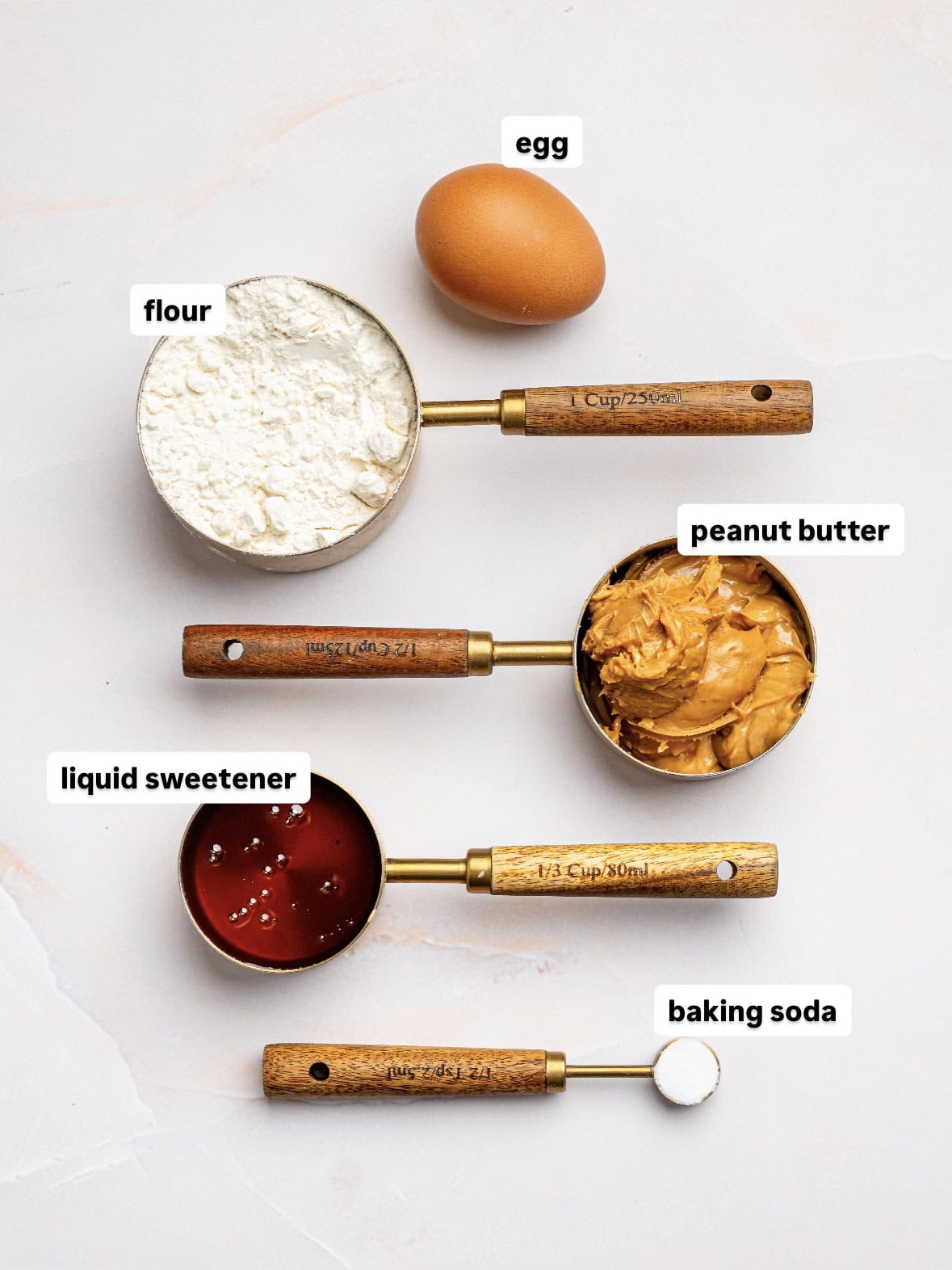 Peanut butter cookies ingredients on a counter top.