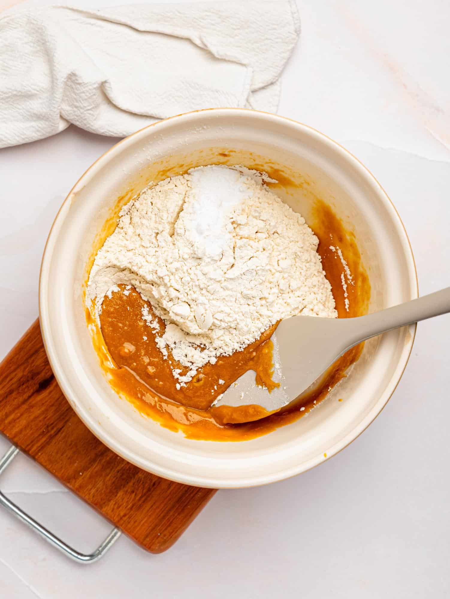 Peanut butter cookies with no butter ingredients in a bowl.
