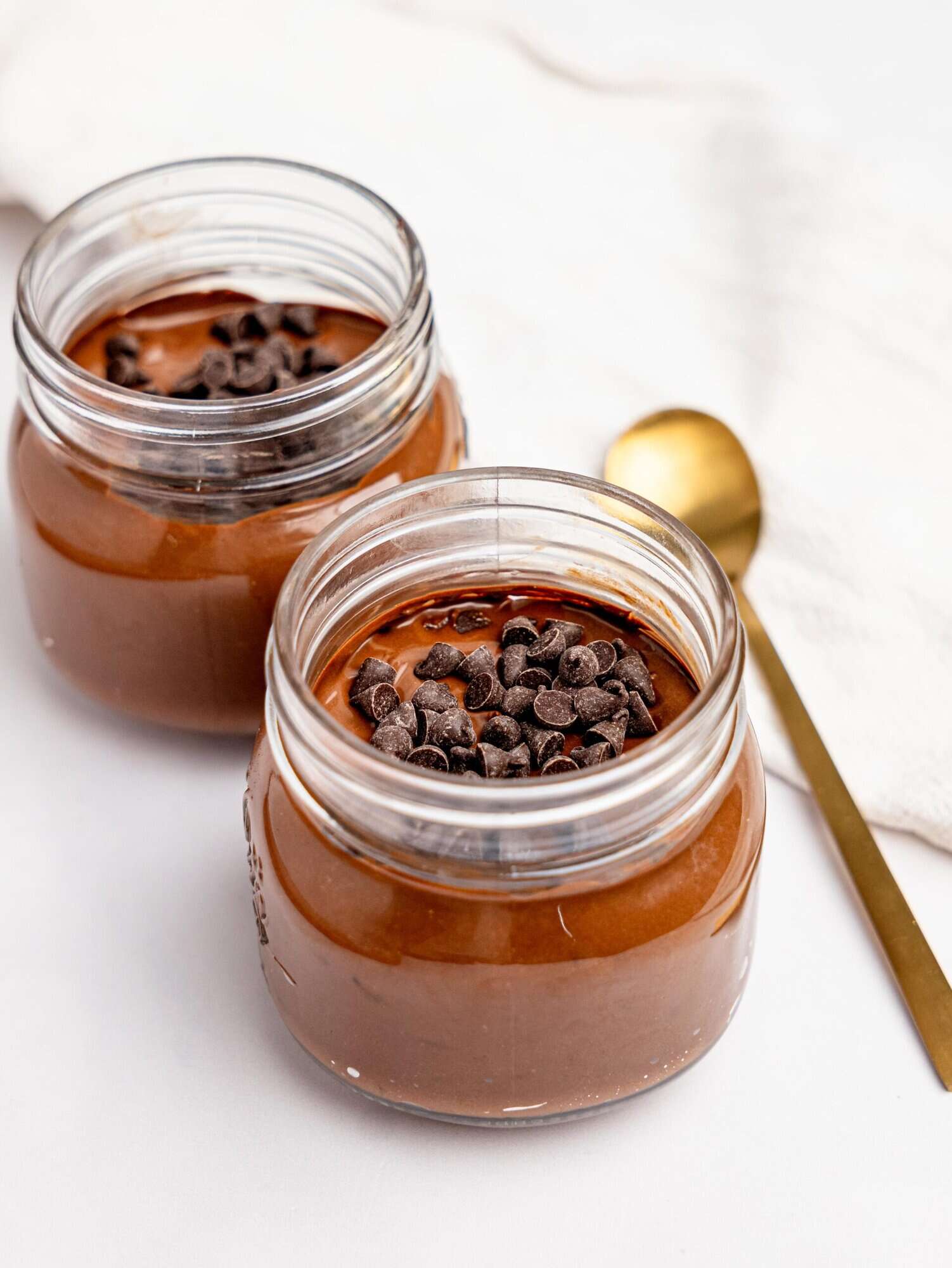 Two jars of cottage cheese mocha mousse.