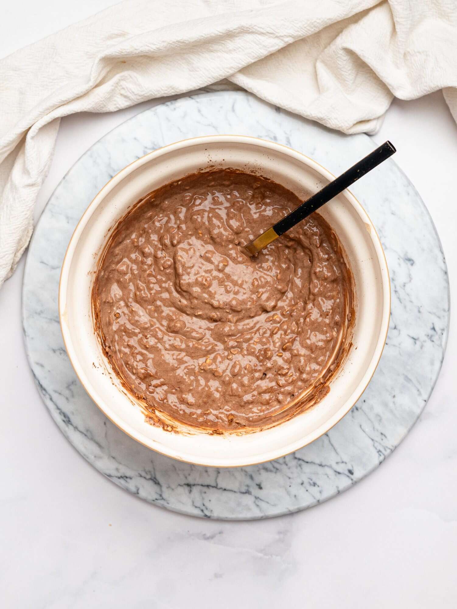Chocolate Overnight Oats in a mixing bowl.