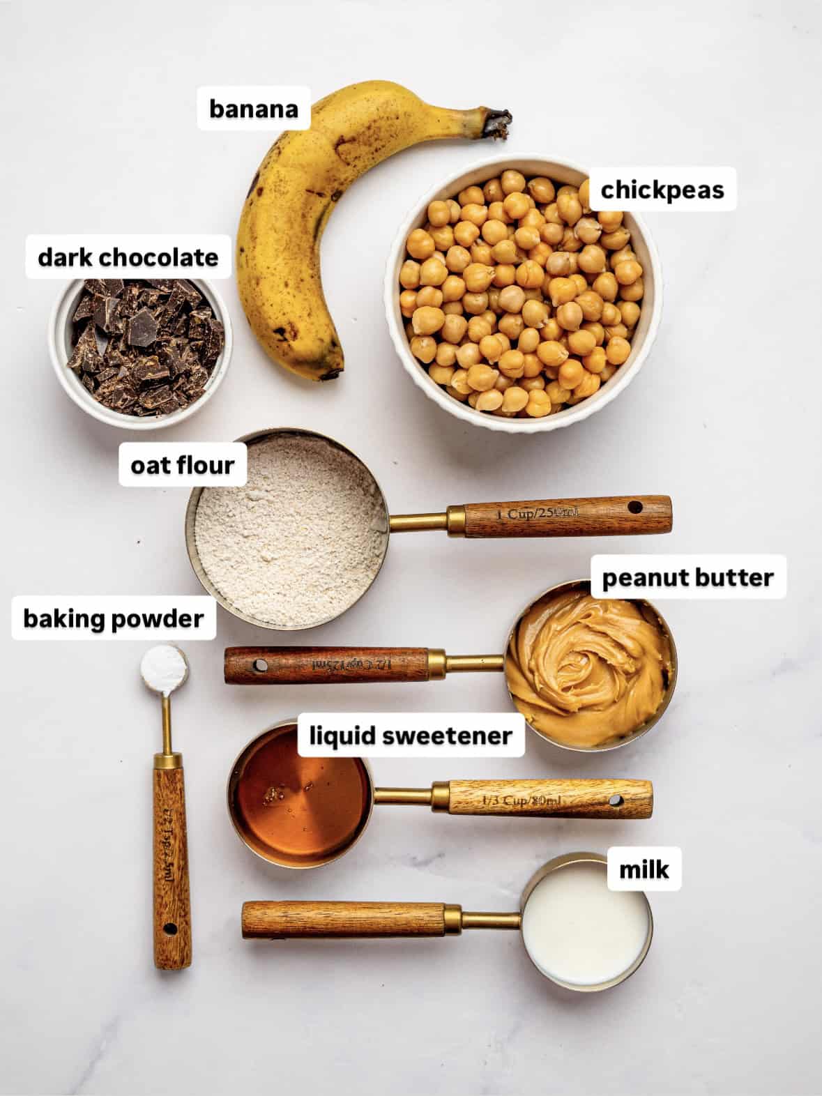 Ingredients needed to make chickpea cookie bars laid out on a counter top.