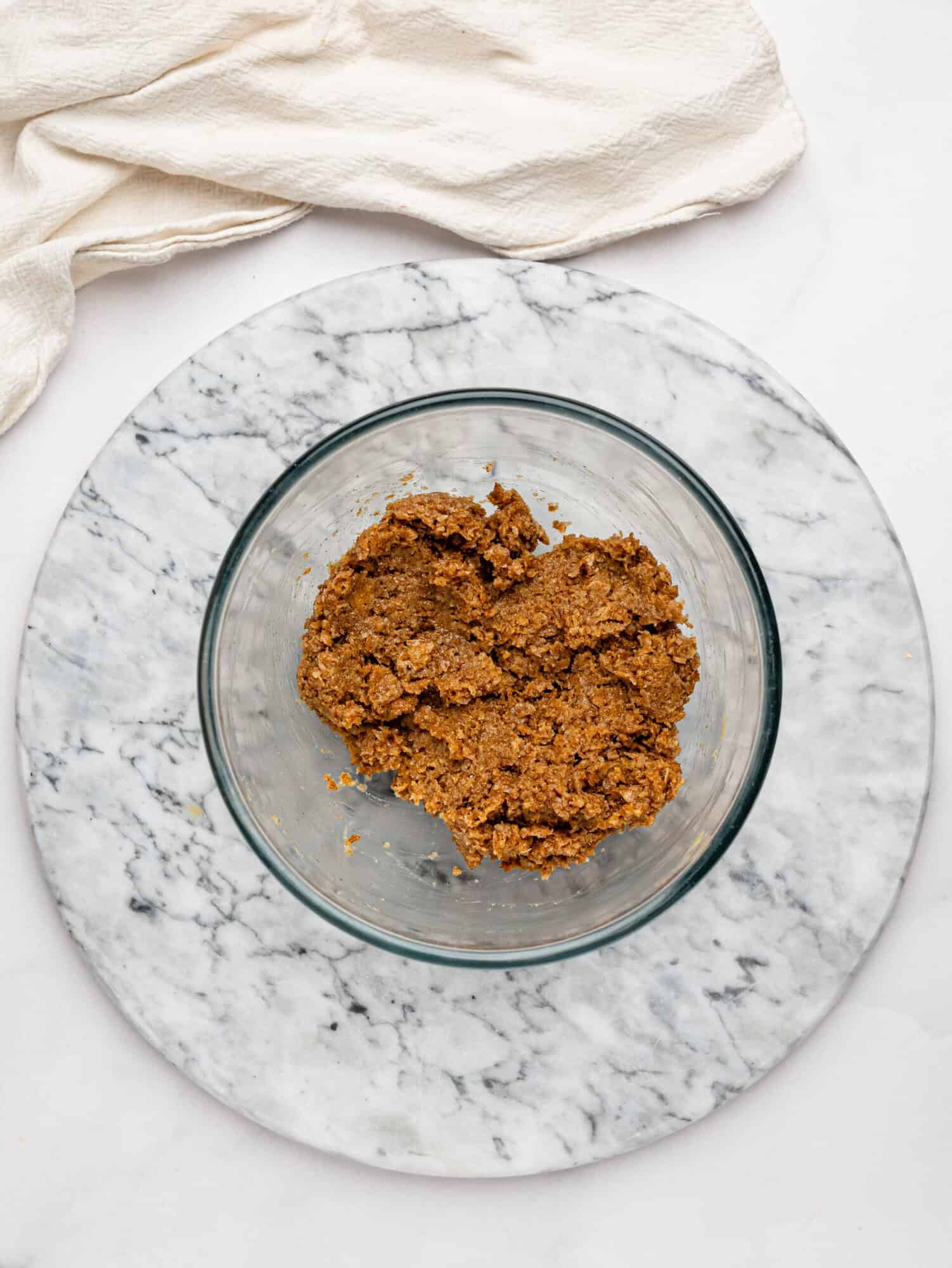 Weetbix Millionaires' Cups base mixture in a glass bowl.