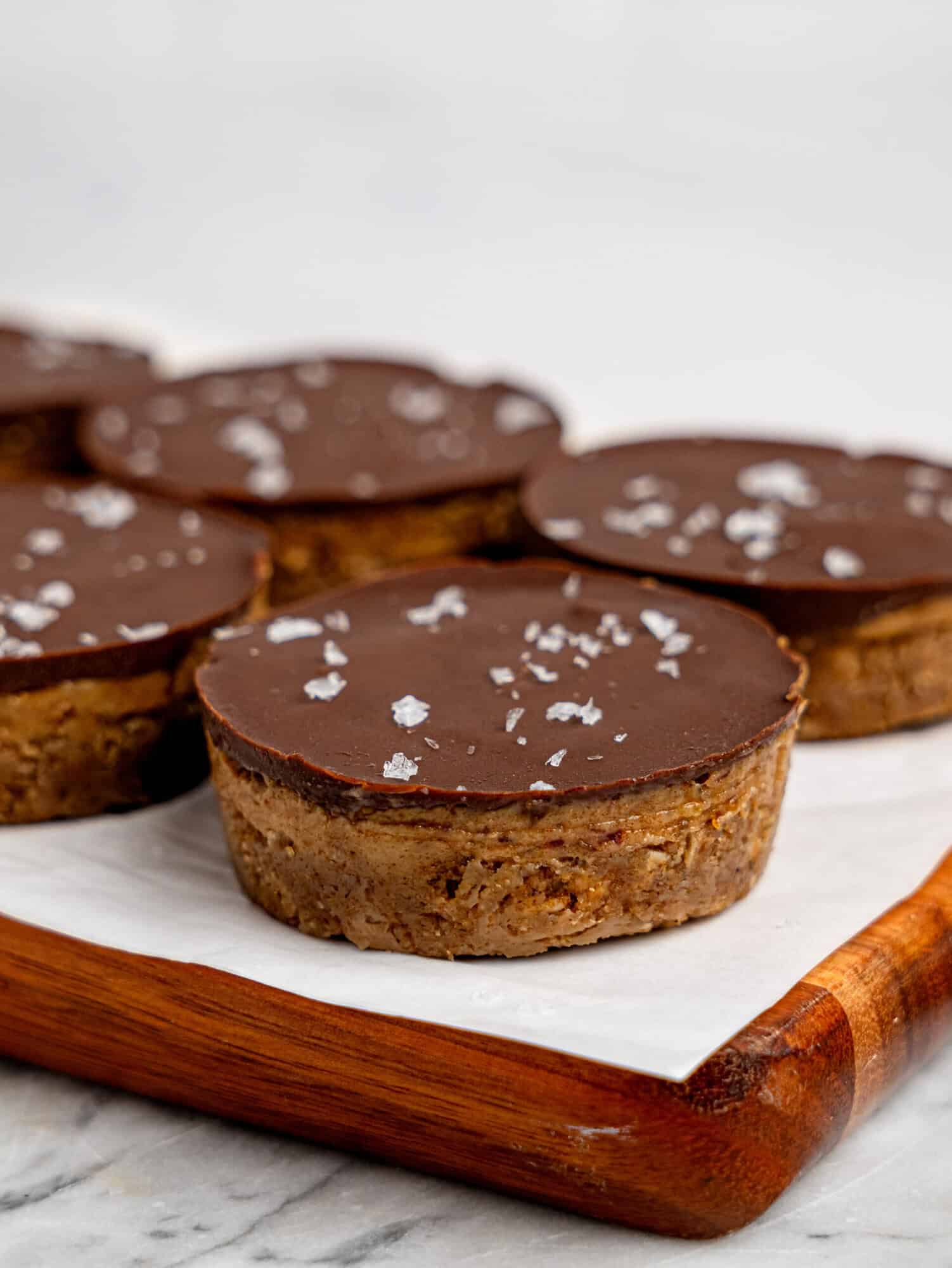 Millionaires' Weetbix Cups on a wooden board.