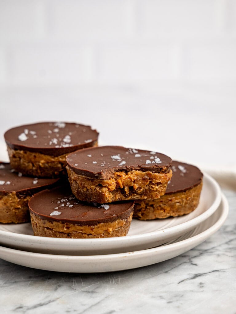 Millionaires' Weetbix Cups stacked on a white plate.
