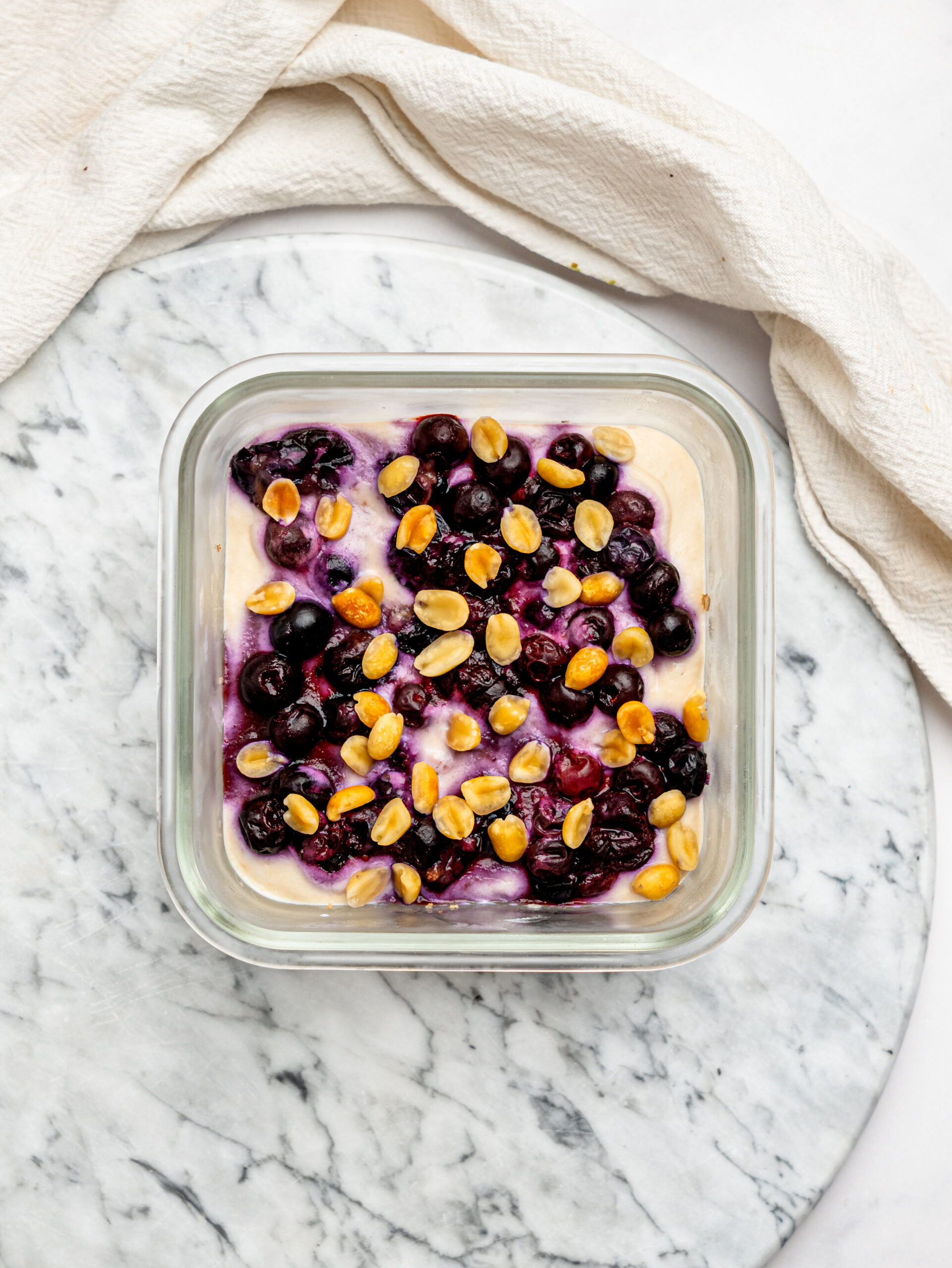 Creamy peanut butter overnight Weetbix topped with juicy mixed berries and crunchy peanuts.