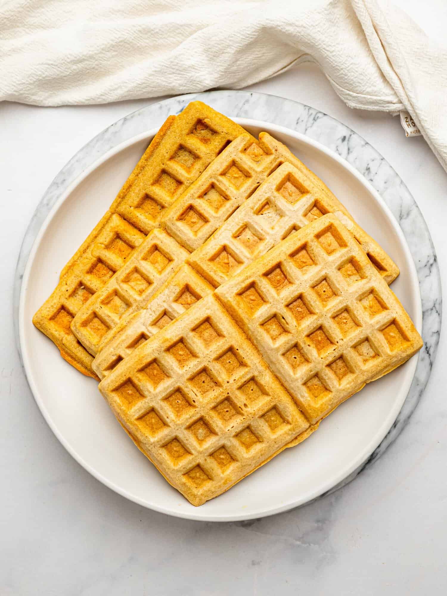 Gluten-free oat flour waffles made for meal prep and easy breakfasts.