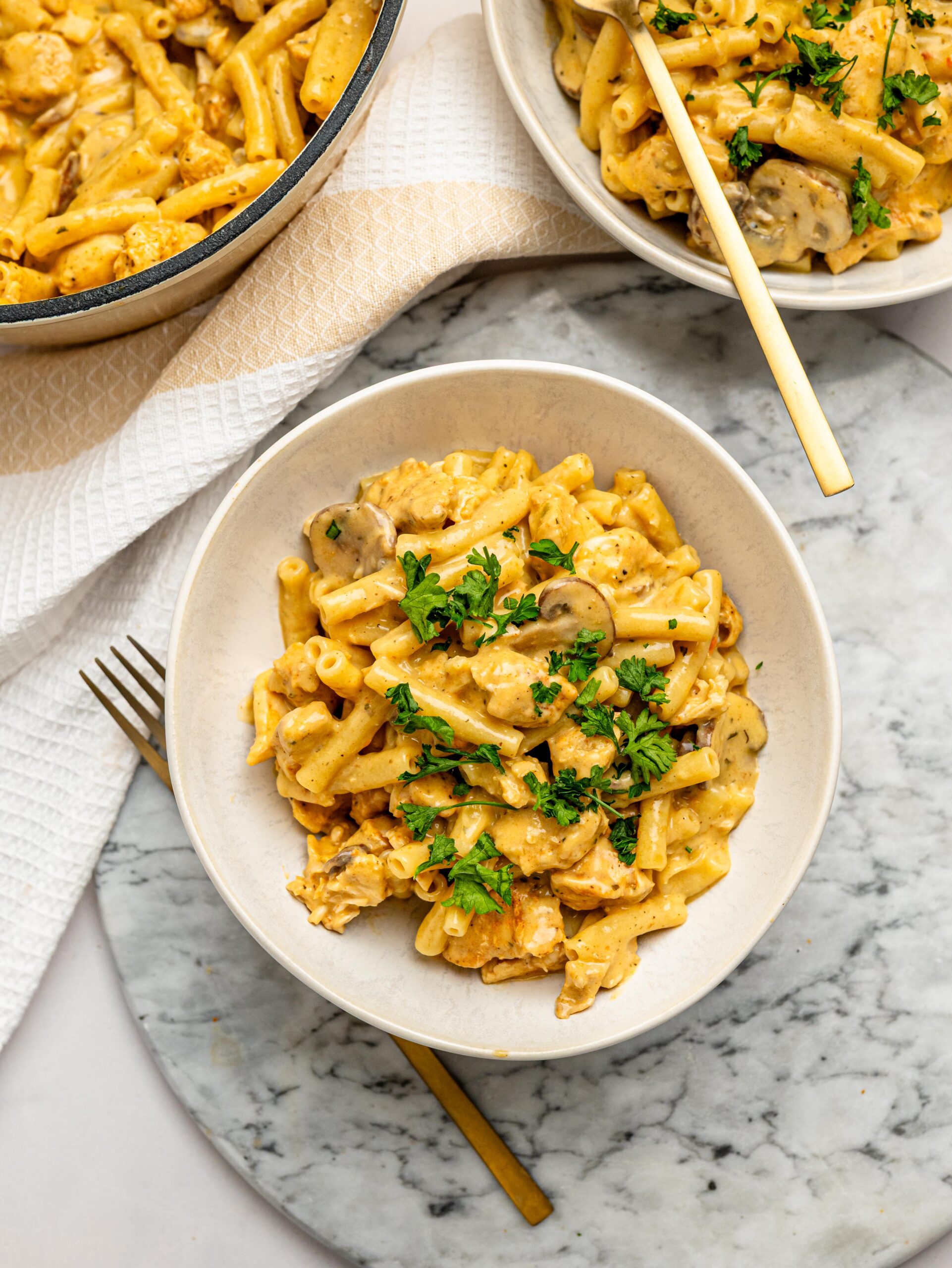 Overhead view of one pot mac and cheese with chicken and mushrooms.