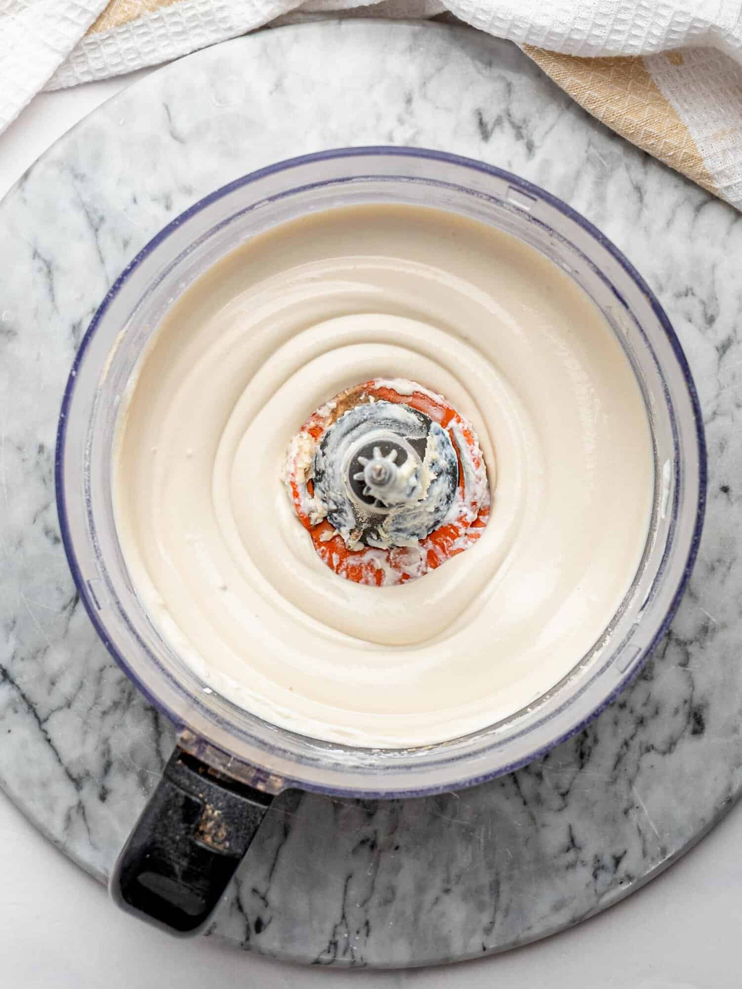 Protein pudding being blended until smooth and creamy.
