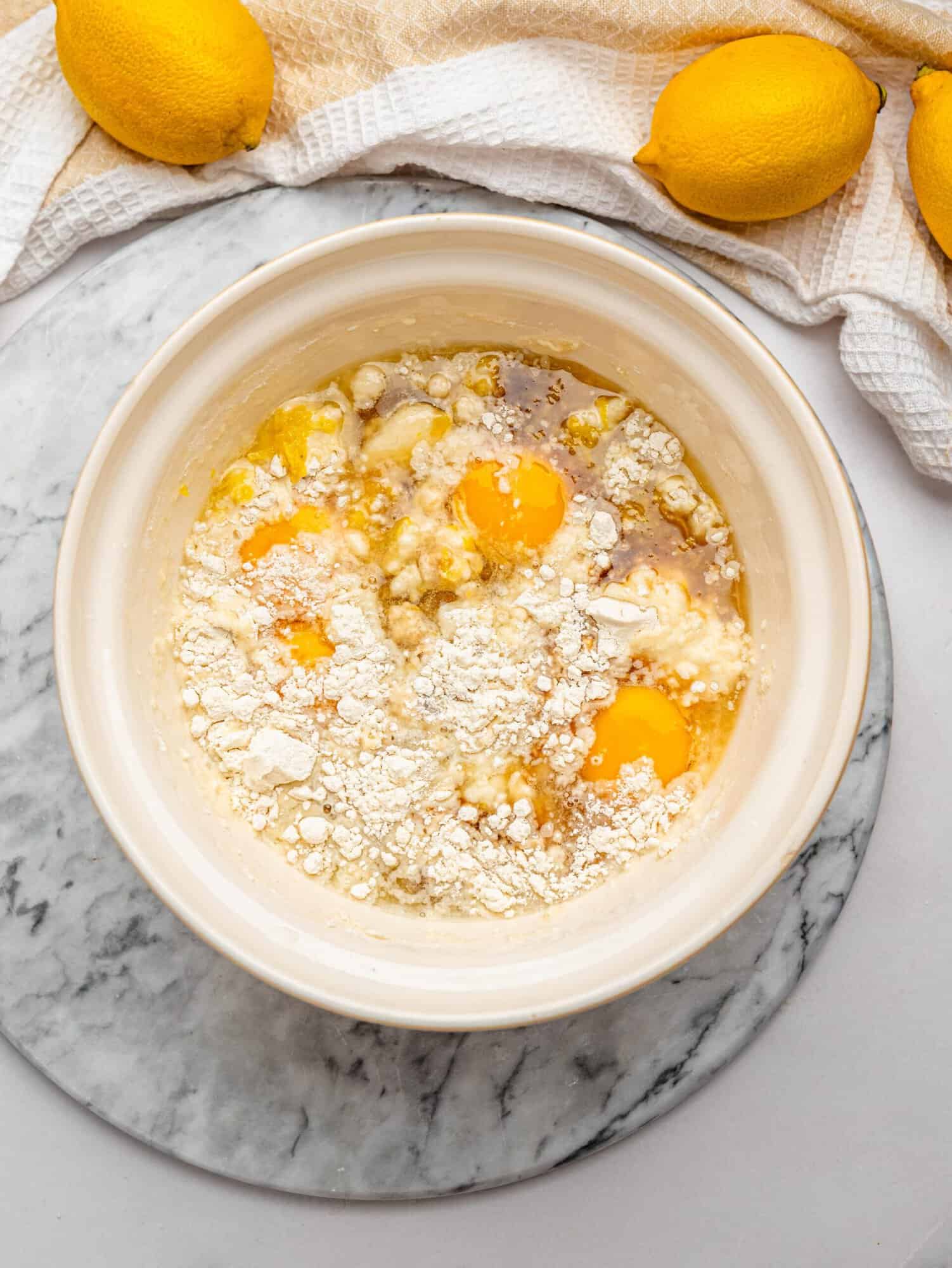Lemon bar filling ingredients in a bowl.