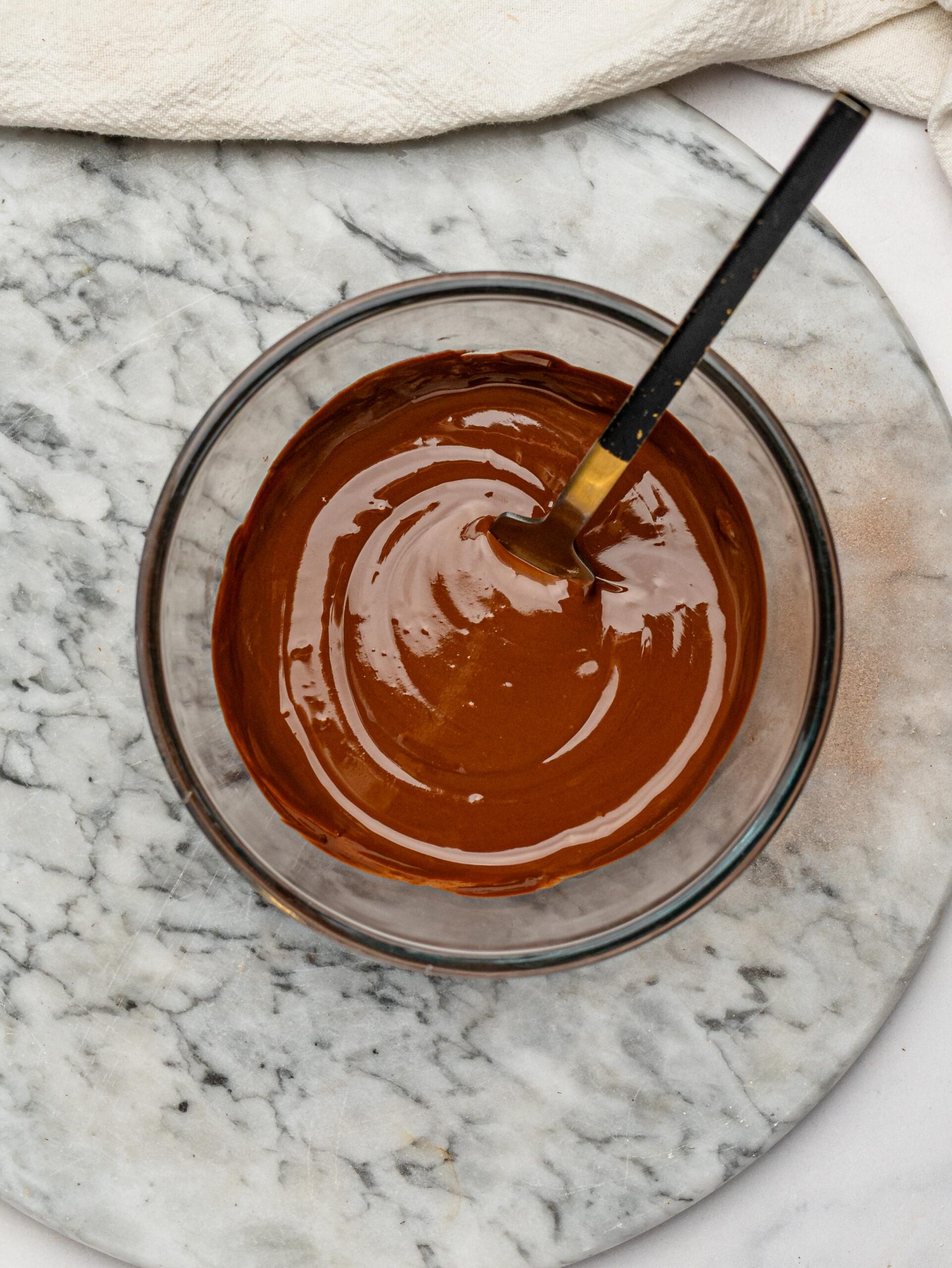 Melted dark chocolate mixed with peanut butter for the chocolate topping.
